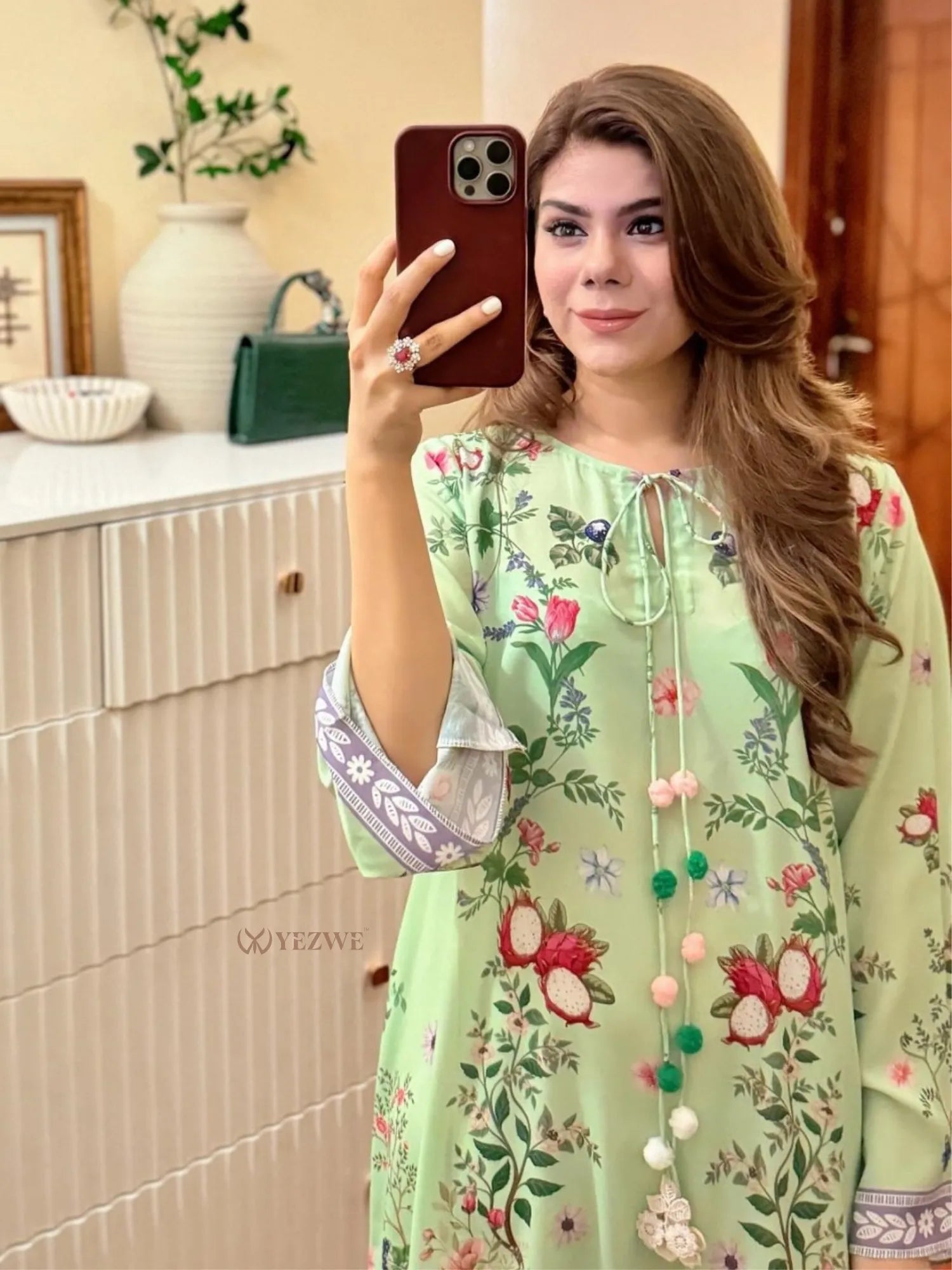 YEZWE Printed Maxi Kaftan light green floral tunic with tassel ties worn by woman taking mirror selfie