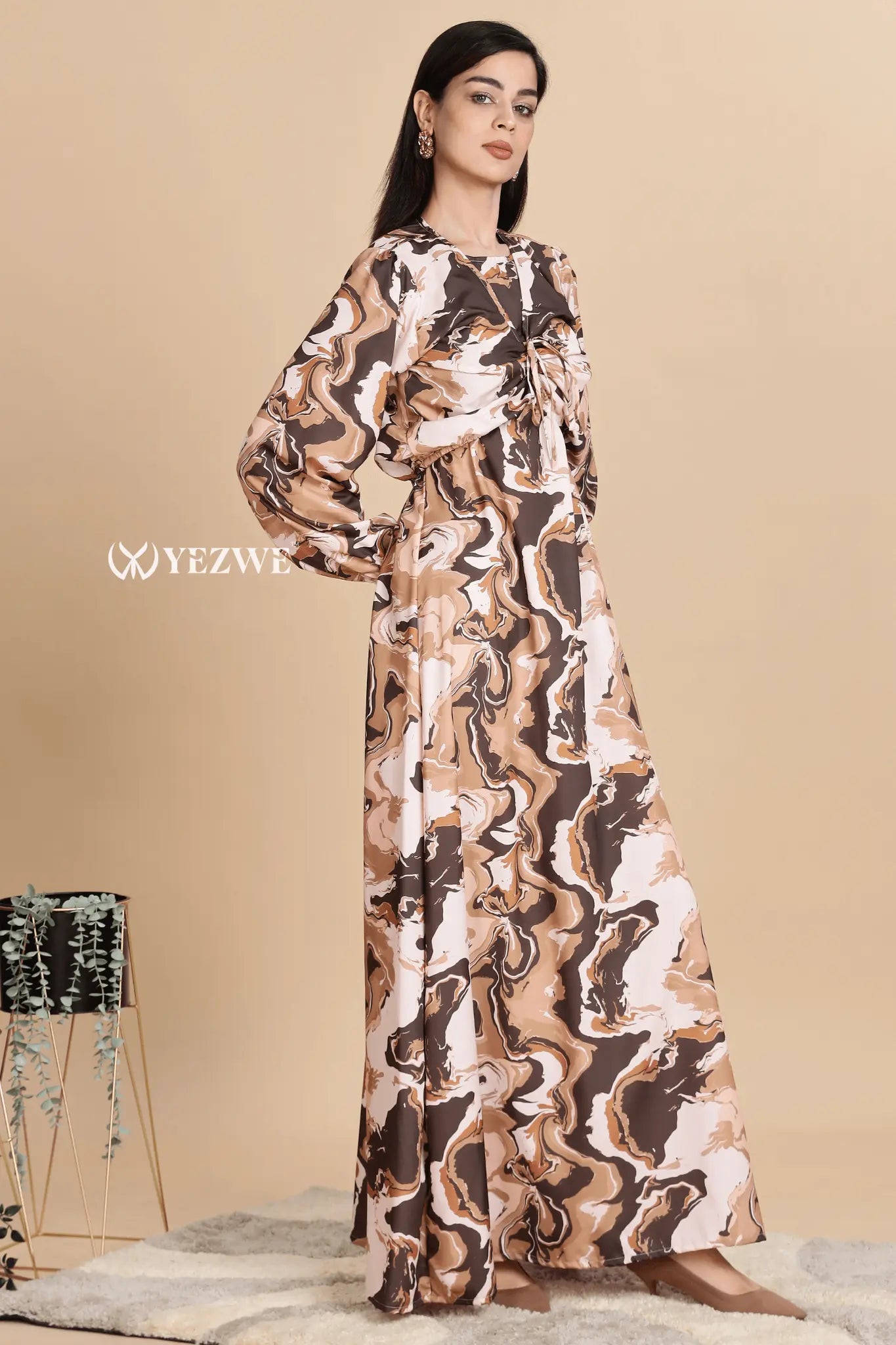 Elegant Swiss imported maxi dress in a trendy abstract print with long sleeves for stylish outings