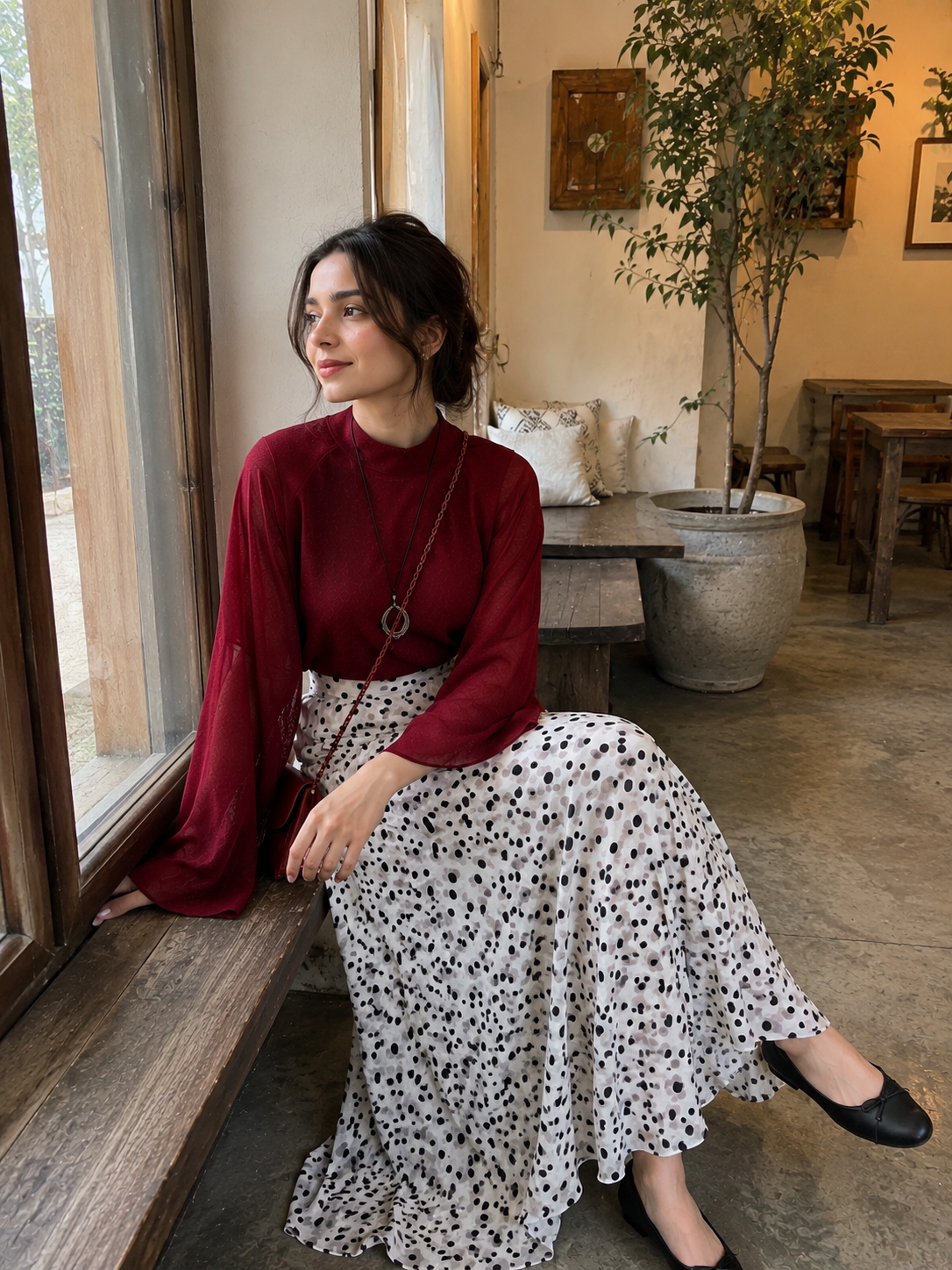 YEZWE Wine Red Fusion Mock-Neck Top & Polka Dot Co-ord Style Co ord worn in a cozy café setting