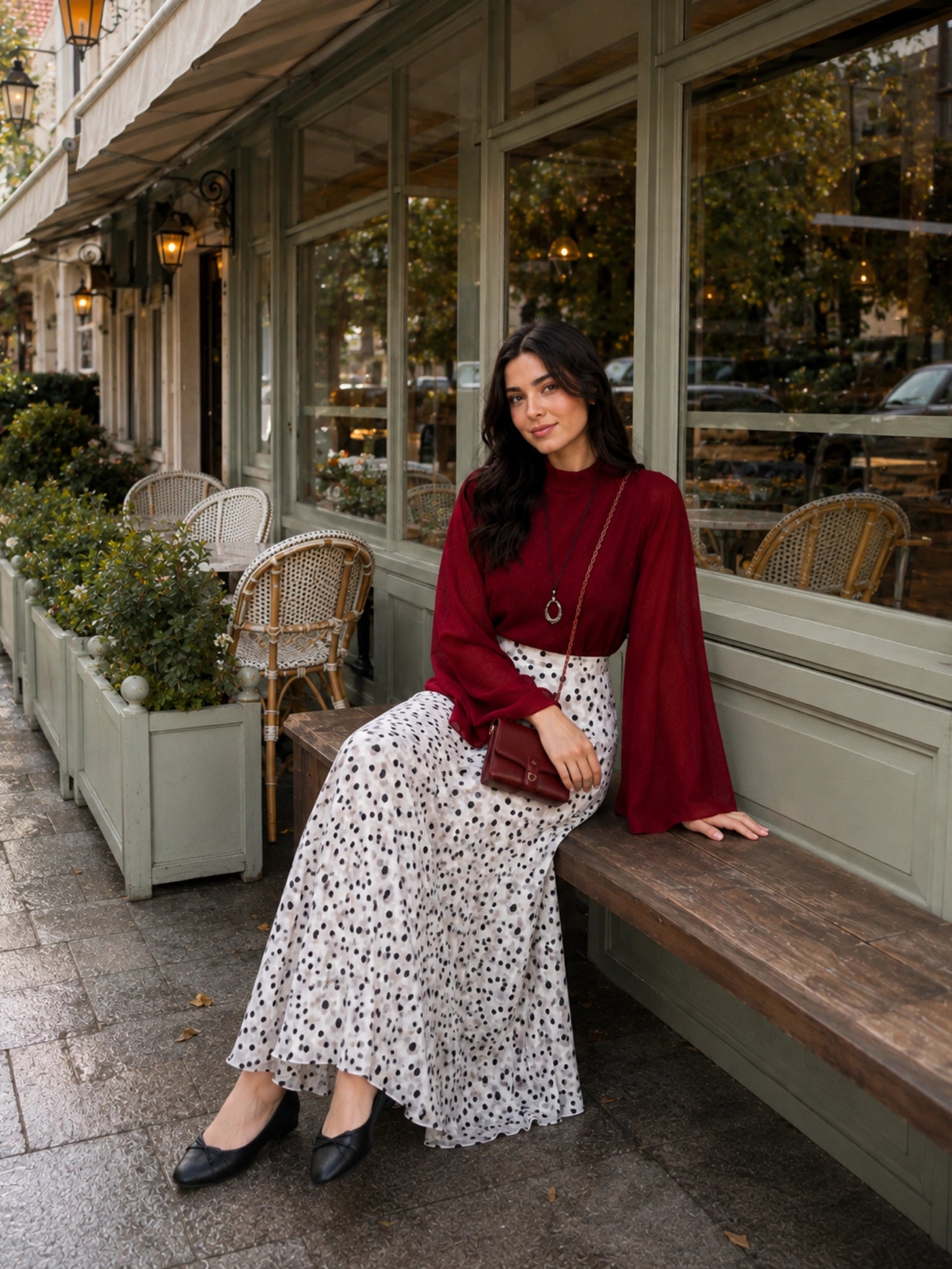 YEZWE Wine Red Fusion Mock-Neck Top & Polka Dot Co-ord Style Co ord with a model seated outdoors