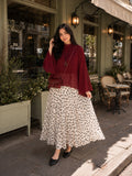 YEZWE Wine Red Fusion Mock-Neck Top & Polka Dot Co-ord Style Co ord with flowy skirt in an outdoor cafe setting