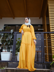 Yezwe yellow textured maxi dress with long sleeves and ruffled hem, perfect for summer outings